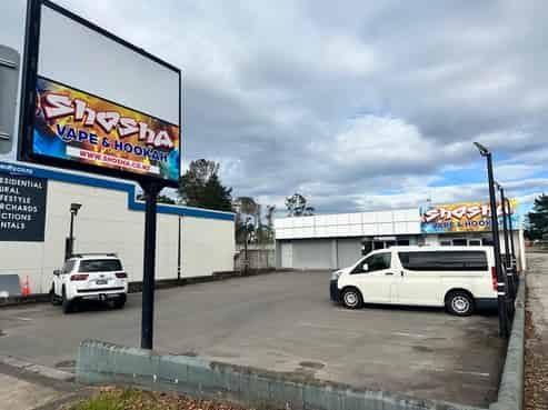 High profile retail with generous parking
