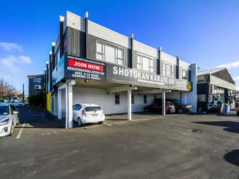 Prominent corner site investment with upside