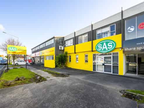 Prominent corner site investment with upside