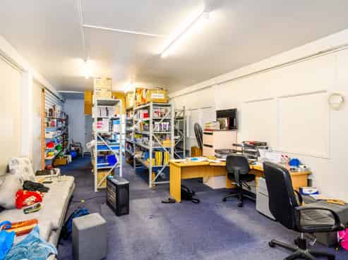 Prominent corner site investment with upside
