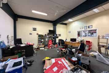 Central showroom/office with 15 car parks