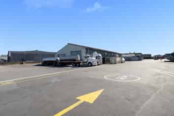 Substantial yard & buildings - prime Mt location