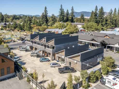 Fully tenanted commercial investment with apartment!
