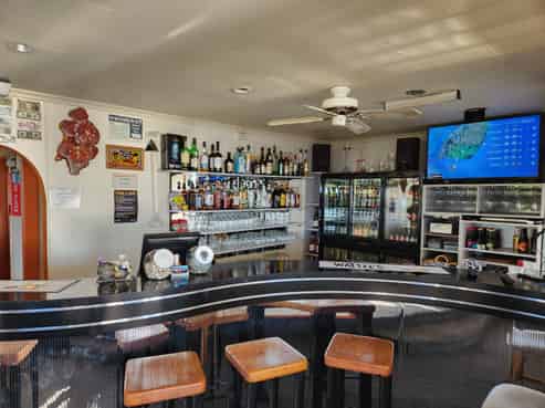 Lucrative Motel with beach life - room to grow