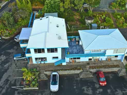 Lucrative Motel with beach life - room to grow
