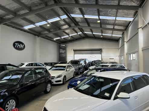 Central warehouse/showroom with yard