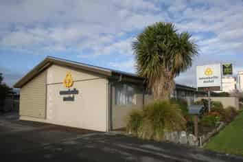 Tidy and Very Profitable 12 Unit Complex