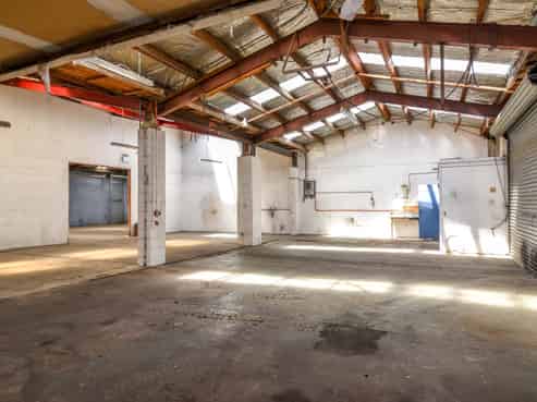 Update! Tidy Small Industrial For Lease