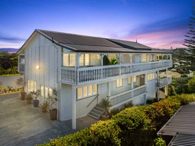 Iconic Lodge - With Stunning Views & Income!