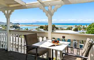 Iconic Lodge - With Stunning Views & Income!