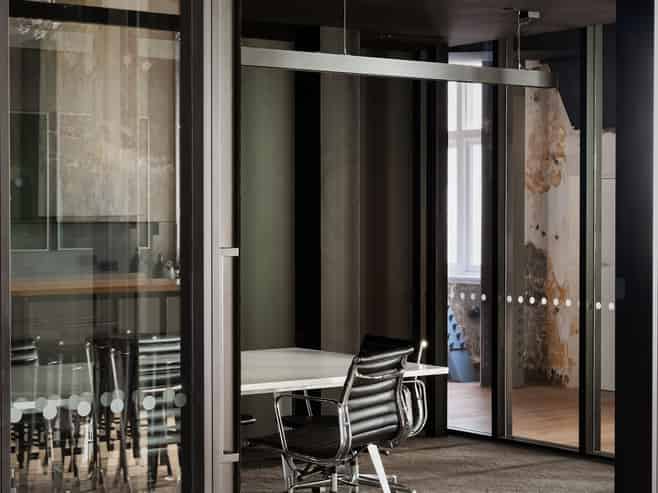Top floor office within architectural icon
