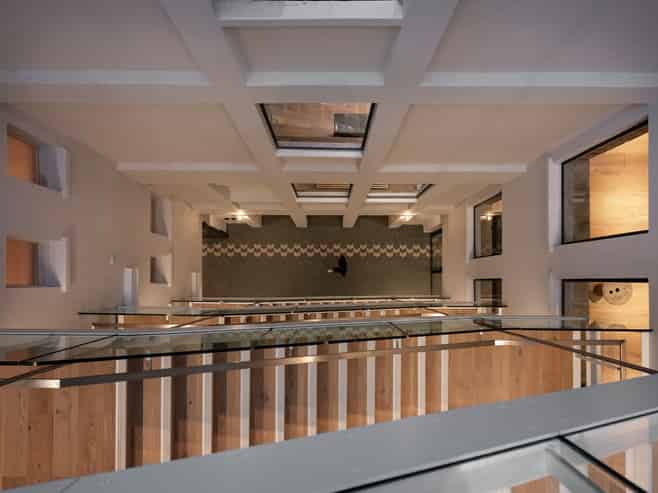 Top floor office within architectural icon