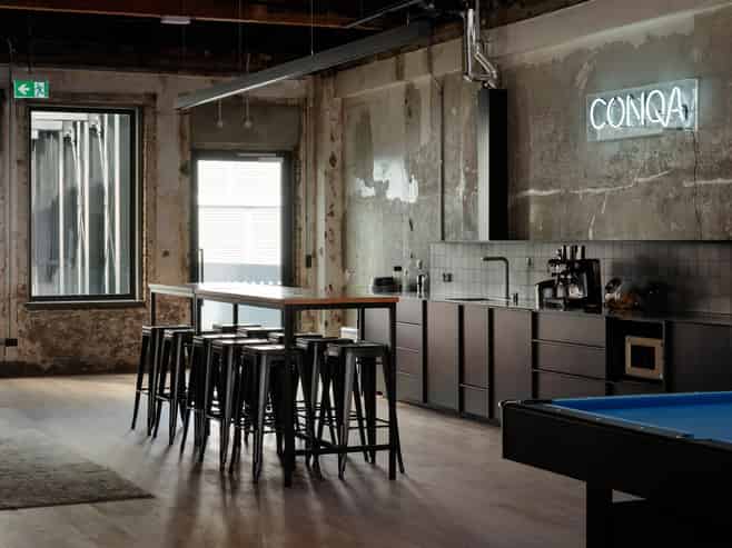 Top floor office within architectural icon