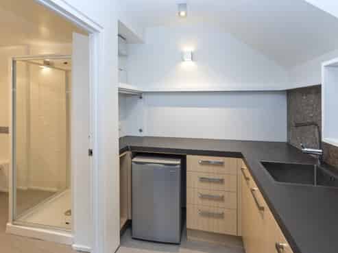 Own & occupy this tidy office building