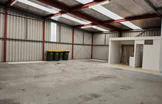 HIGH-STUD WAREHOUSE WITH OFFICE AND LIVING
