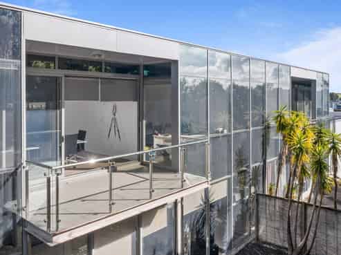 Upper floor office with deck and storage