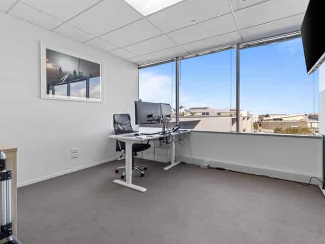 Upper floor office with deck and storage
