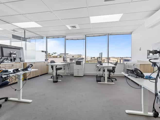 Upper floor office with deck and storage