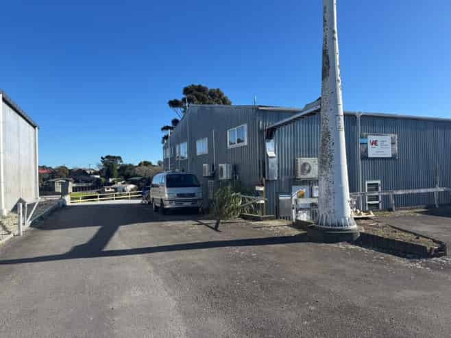 Suburban warehouse with offices and parking