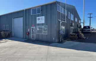 Suburban warehouse with offices and parking