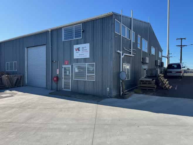 Suburban warehouse with offices and parking