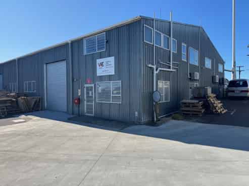 Suburban warehouse with offices and parking