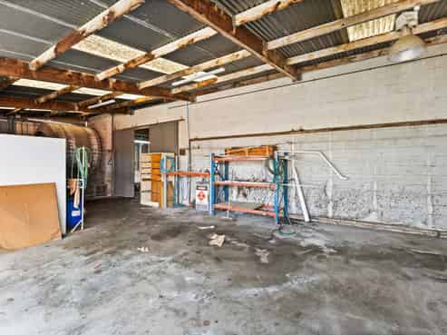Well-located fully fenced yard and storage