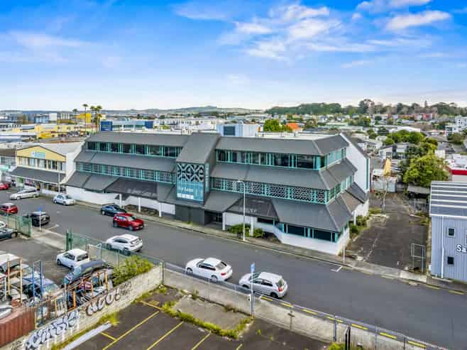 Versatile multi-use building with holding income
