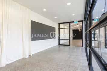 POLISHED CREATIVE WORKSPACE WITH OUTDOOR BREAKOUT