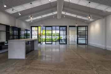 POLISHED CREATIVE WORKSPACE WITH OUTDOOR BREAKOUT