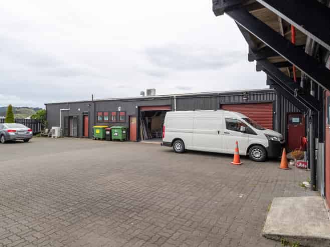 Prime development site with holding income