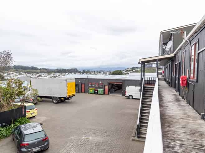 Prime development site with holding income