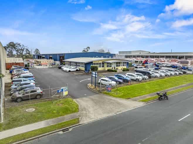 Huge yard + drive-through building