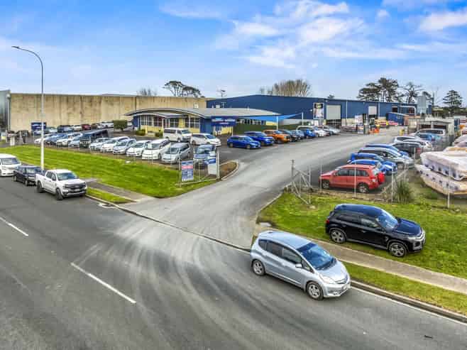 Huge yard + drive-through building