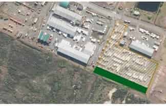 EXTENSIVE METALED YARD APPROXIMATELY 19,000M²
