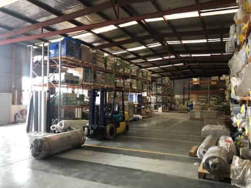 Standalone road front warehouse with secure yard