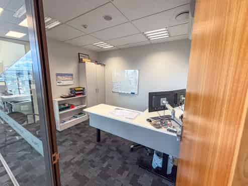 Modern, corner site office with car parks