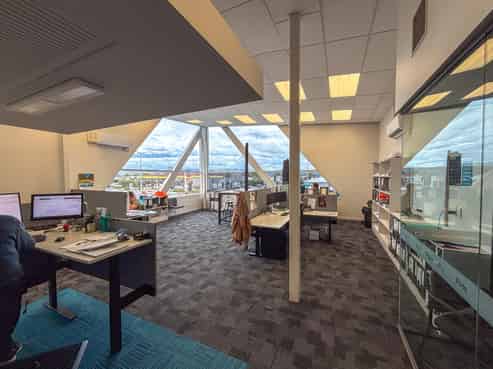 Modern, corner site office with car parks