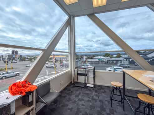 Modern, corner site office with car parks