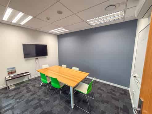 Modern, corner site office with car parks