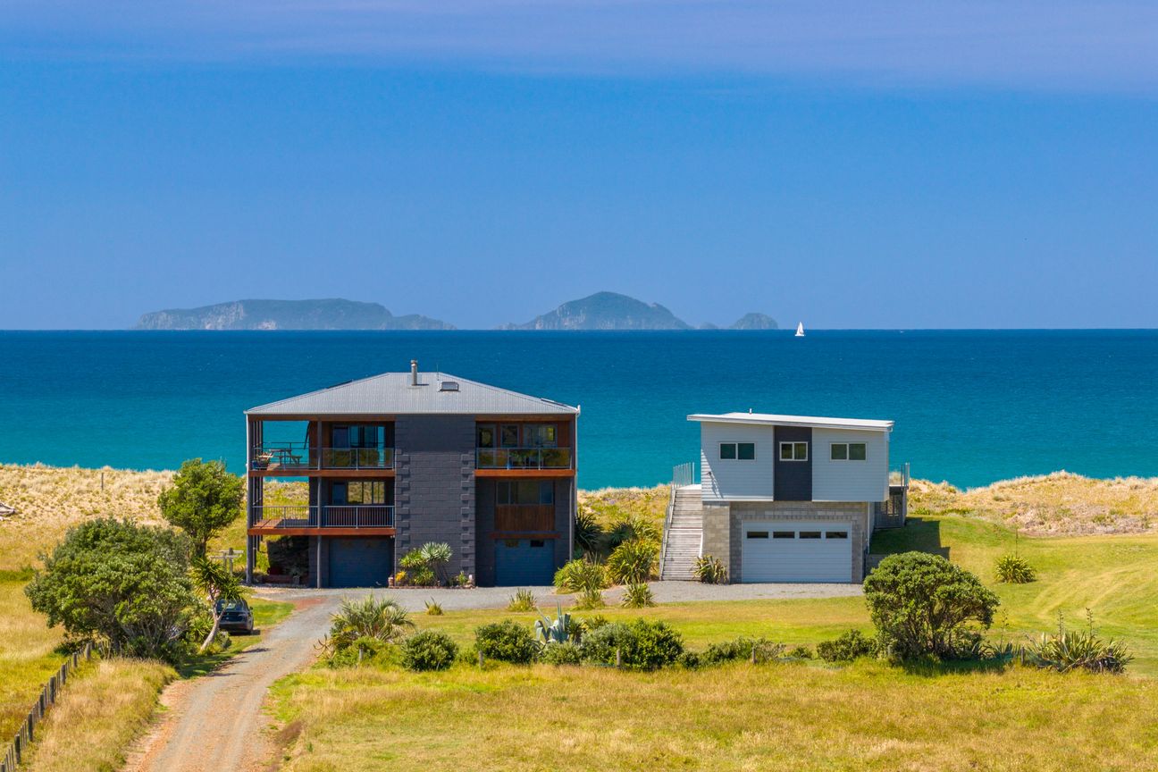 Absolute Beachfront Masterpiece