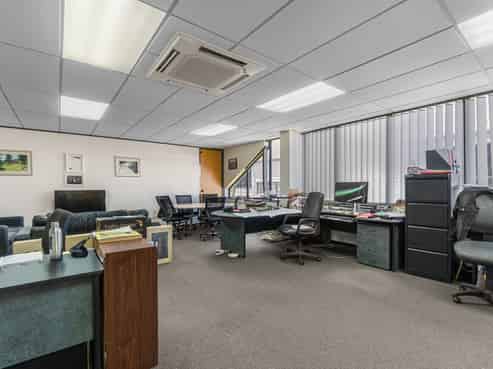 Professional office space fronting busy corner