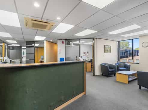 Professional office space fronting busy corner