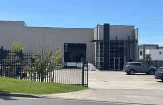 Modern Industrial Facility with Secure Yard