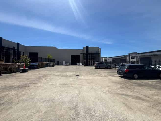 Modern Industrial Facility with Secure Yard