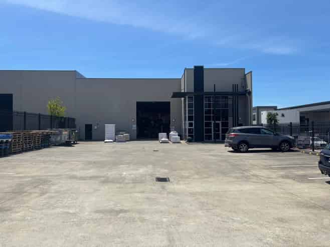 Modern Industrial Facility with Secure Yard
