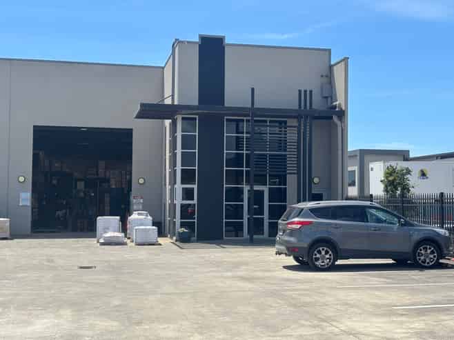 Modern Industrial Facility with Secure Yard