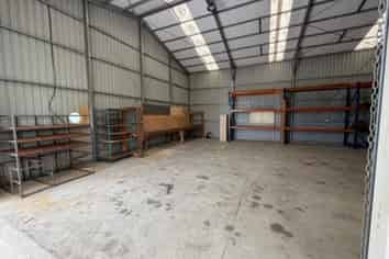Versatile Workshop/Storage Shed in Prime Location
