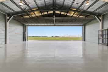 UNDER CONTRACT! Tga Airport Hangar