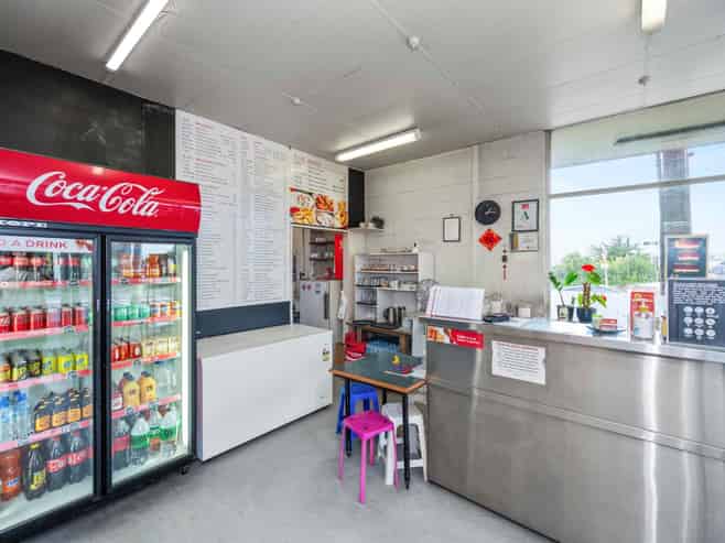 FREEHOLD CORNER SITE - FOUR SHOPS
